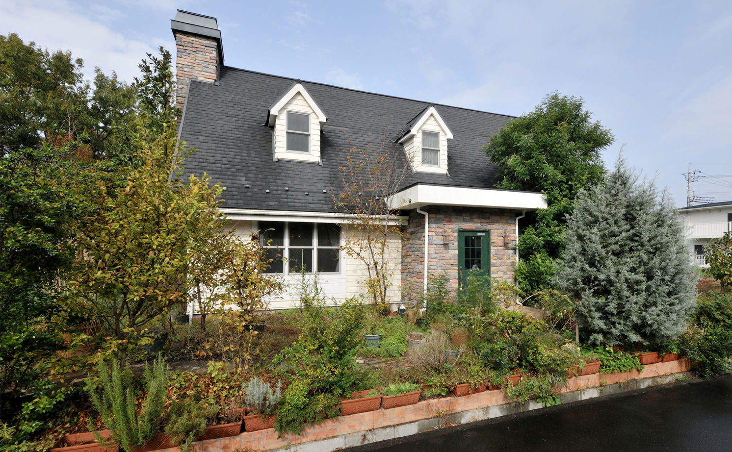 ニットーホーム グランドピアノのあるゆったりとした輸入住宅。大きな煙突のあるノースカントリーの建築実例画像9