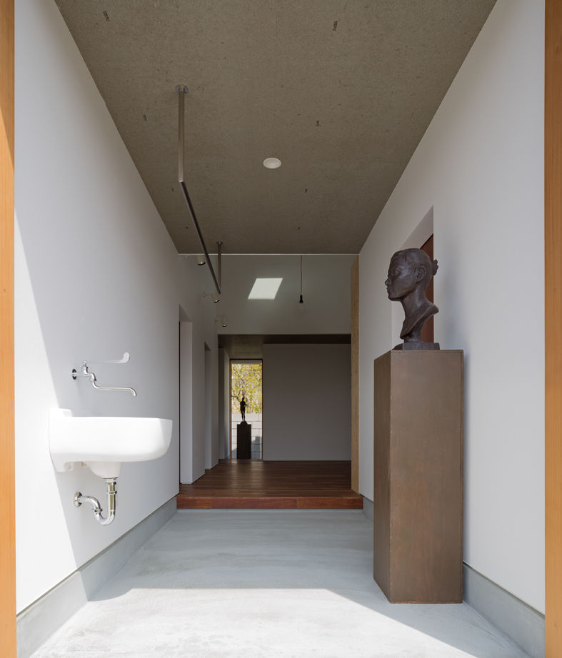 上山建設 【35.8坪/平屋/大開口】アートを楽しむ塗り壁の家の建築実例画像4