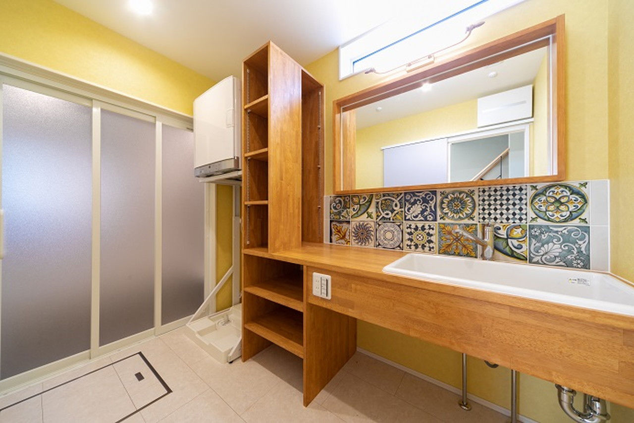 昭栄建設の注文住宅 【鴻巣市/30坪台/吹抜け】安心の構造や性能とやさしい色合いが引き立つ平屋風二階建てのアメリカンハウスの建築実例画像6