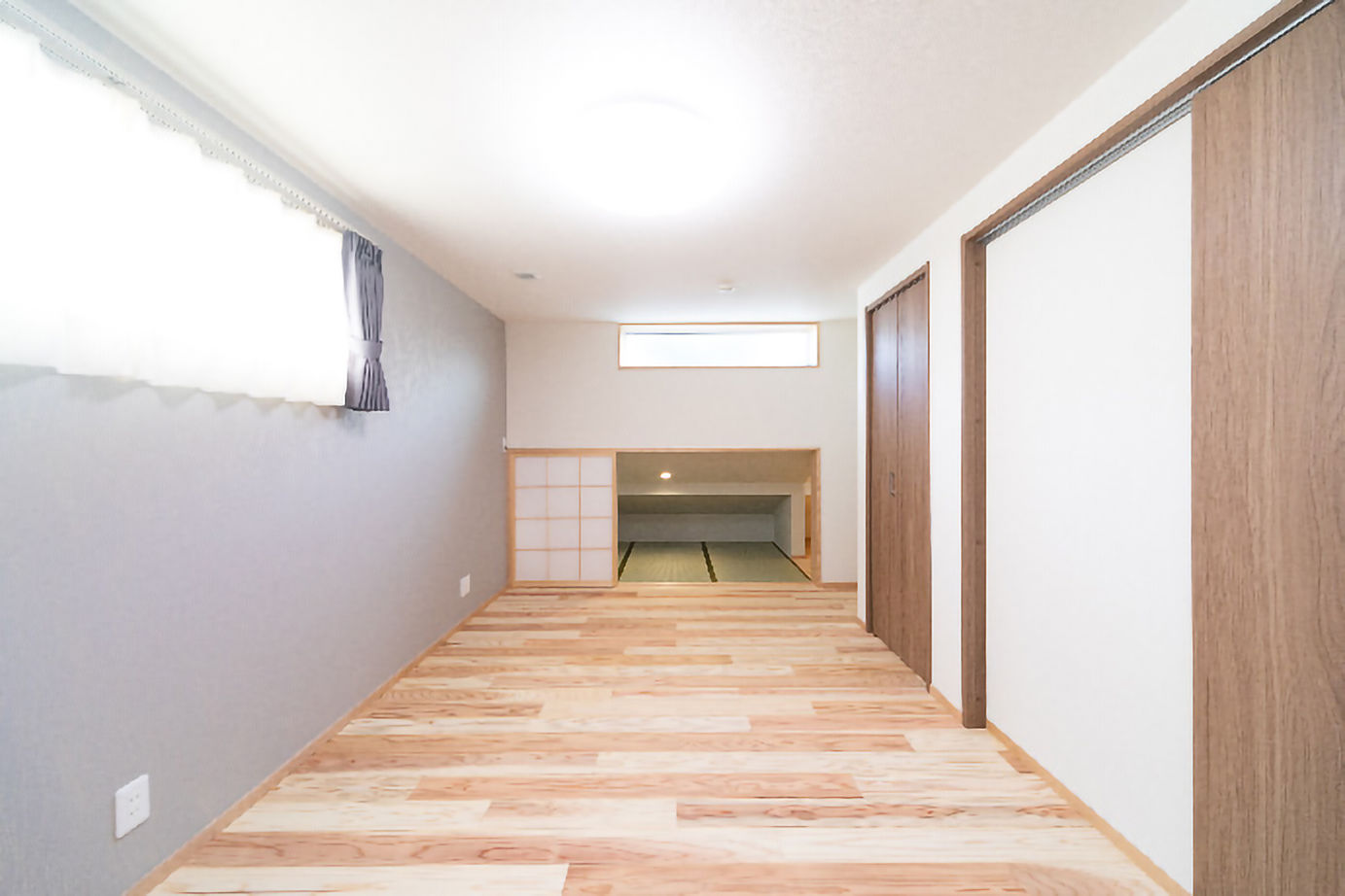 昭栄建設の注文住宅 【さいたま市/30坪台】キッチンを中心に流れるような家事動線を形にした、スキップフロアの住まいの建築実例画像8