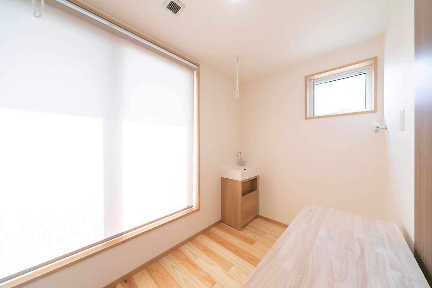 昭栄建設の注文住宅 【さいたま市/30坪台】キッチンを中心に流れるような家事動線を形にした、スキップフロアの住まいの建築実例画像9