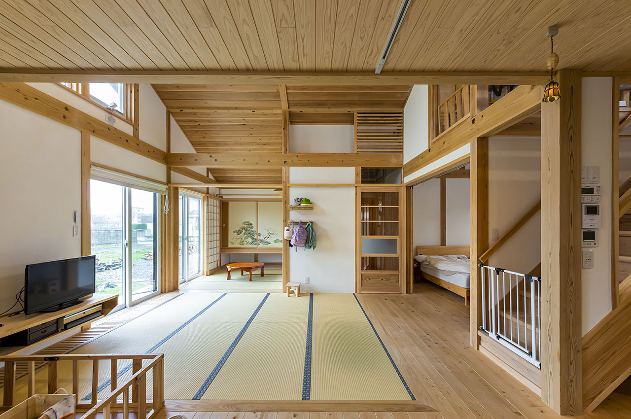佐七建設 薪ストーブと畳リビングの暮らし。壁付けキッチンを採用し空間に十分なゆとりを設けた自然素材の住まいの建築実例画像6