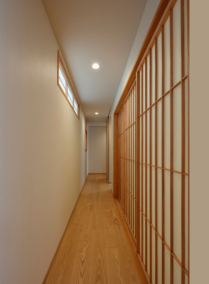 厚見建設工業 【平屋/インナーガレージ/間取図有】北棟＋南棟、2棟構成。シンプル＆品格を纏う大人のための平屋の建築実例画像8