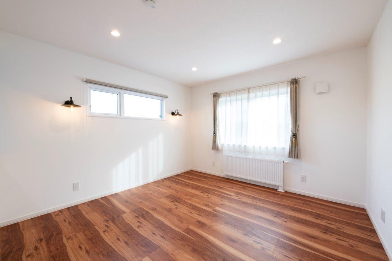 コスモ建設 吹抜け玄関とハイスタット仕様の家の建築実例画像5