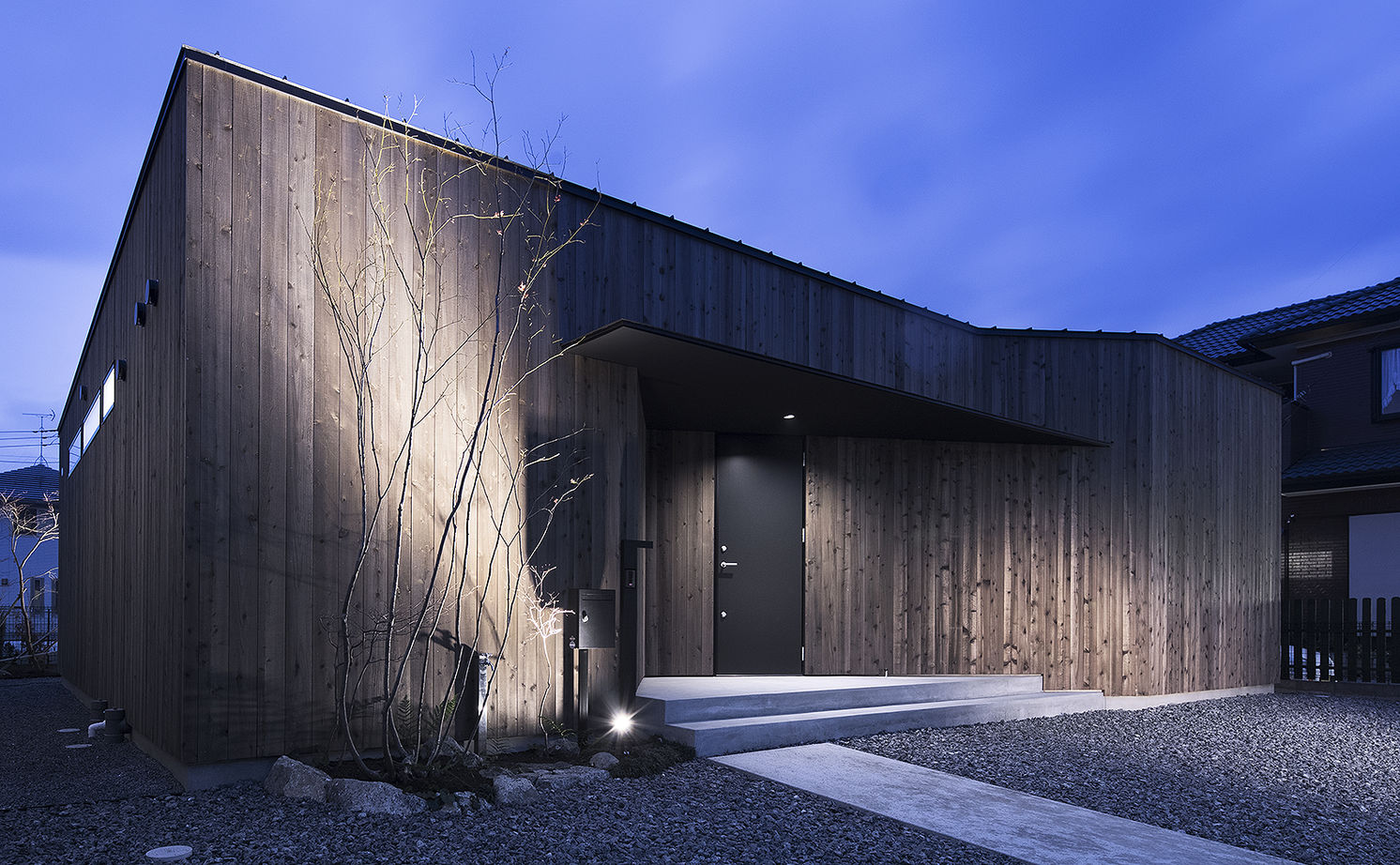 ＳＵＤＯホーム　須藤建設 【2000万円台/中庭/平屋】風の流れを回遊させるブーメラン形状の建物でプライバシーと開放感を両立の建築実例画像2