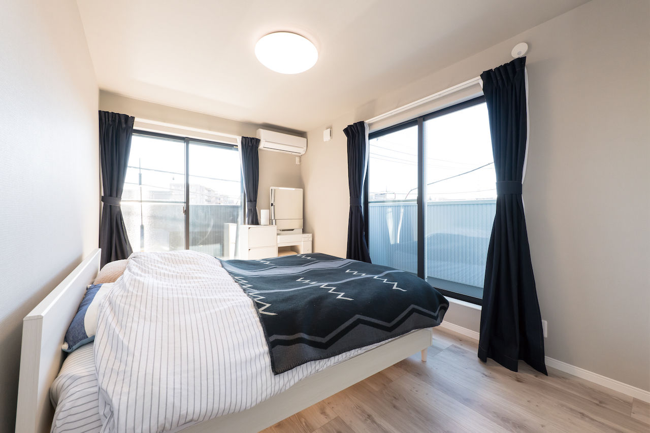 ダイヤビルト 【間取り/3階建て/ビルトインガレージ】光の射すL字型バルコニー。プライバシーにも配慮したガレージハウスの建築実例画像9