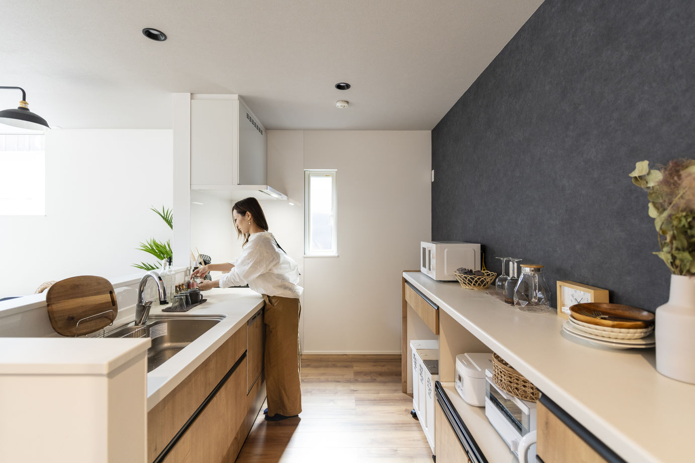 竹内建設 【札幌市/2000万円台/テラス】L字型の軒下空間がつくる印象的な外観の建築実例画像5