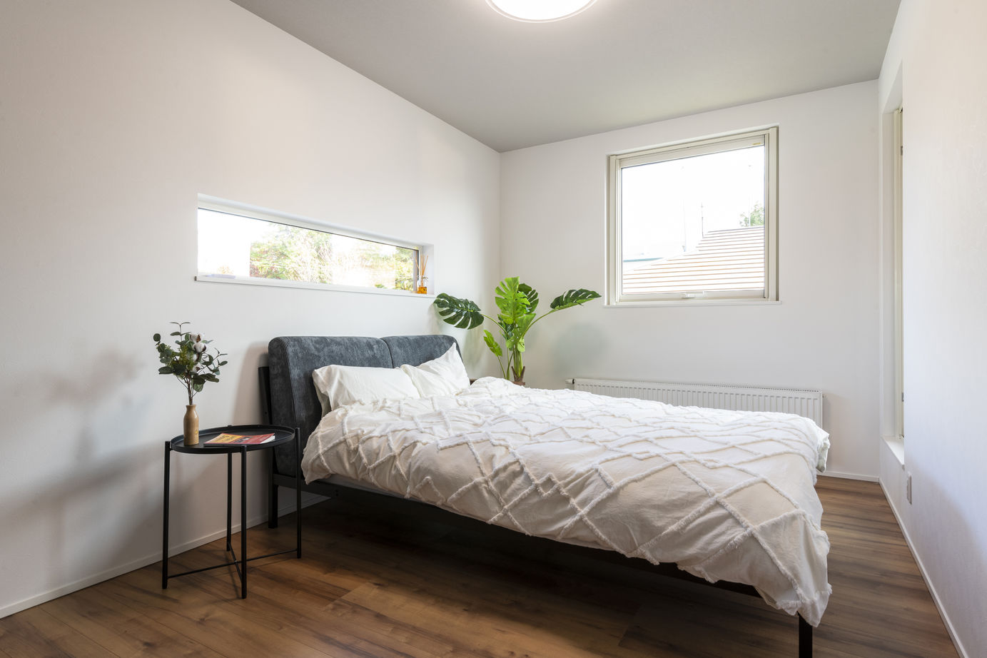 竹内建設 【札幌市/2000万円台/テラス】L字型の軒下空間がつくる印象的な外観の建築実例画像9