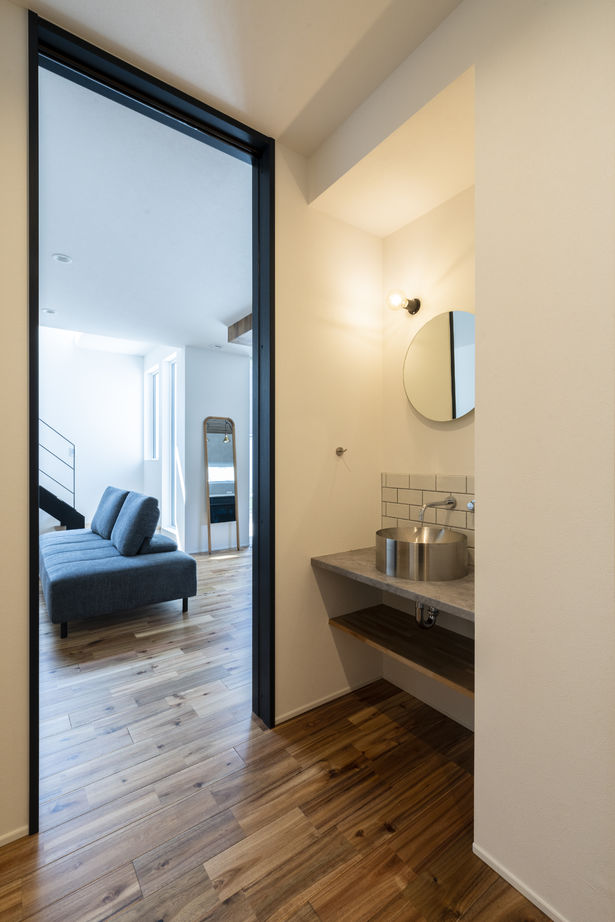 竹内建設 【江別市/土間テラス/ナチュラル】ゆったりと家族の時間をはぐくむコの字の間取りの建築実例画像2