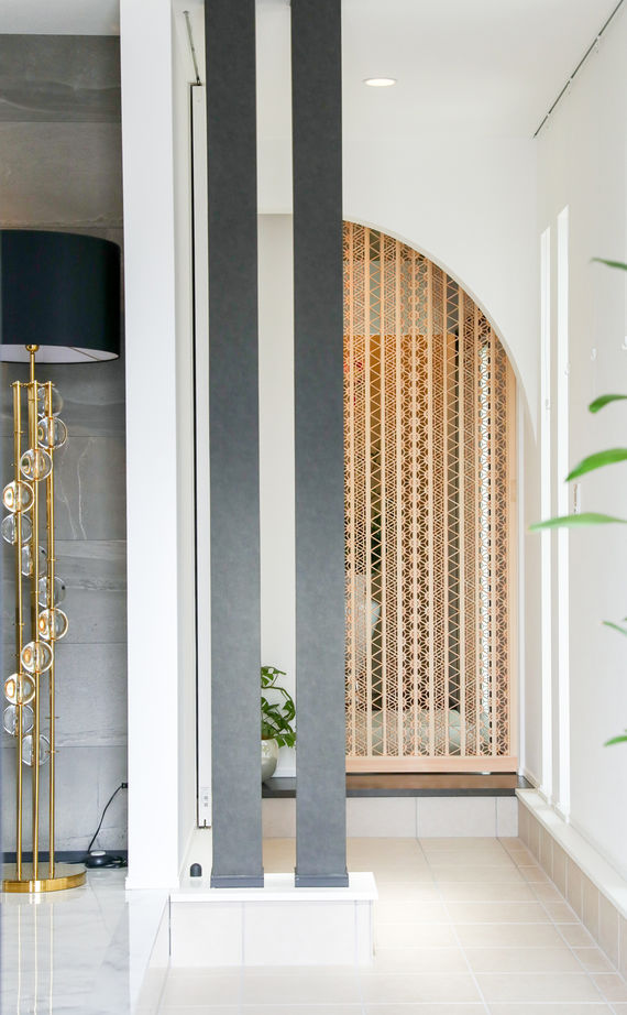 小林住宅 【大阪府/吹抜け/ダウンリビング】モノトーンの大空間にステイタス感があふれる大人の家の建築実例画像4