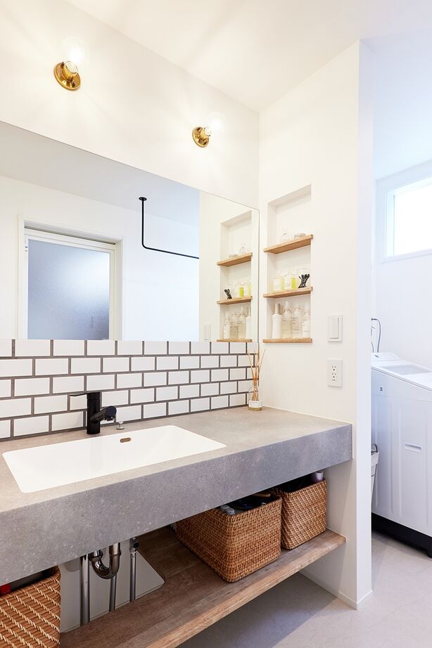 田辺工務店　一級建築士事務所 【藤沢市/2LDK/吹抜け】中庭とつながる大開口で開放感抜群。吹抜けのあるカフェ風の住まいの建築実例画像10