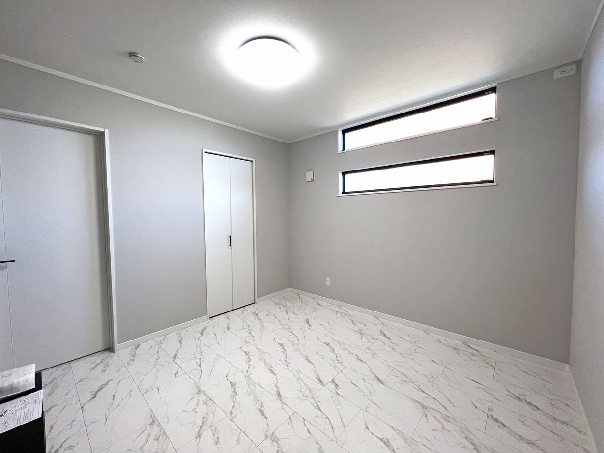 大成住宅 【2LDK/インナーガレージ/WIC/間取り図有】趣味を楽しみオープンエアリビングで寛ぐ2階リビングの家の建築実例画像6