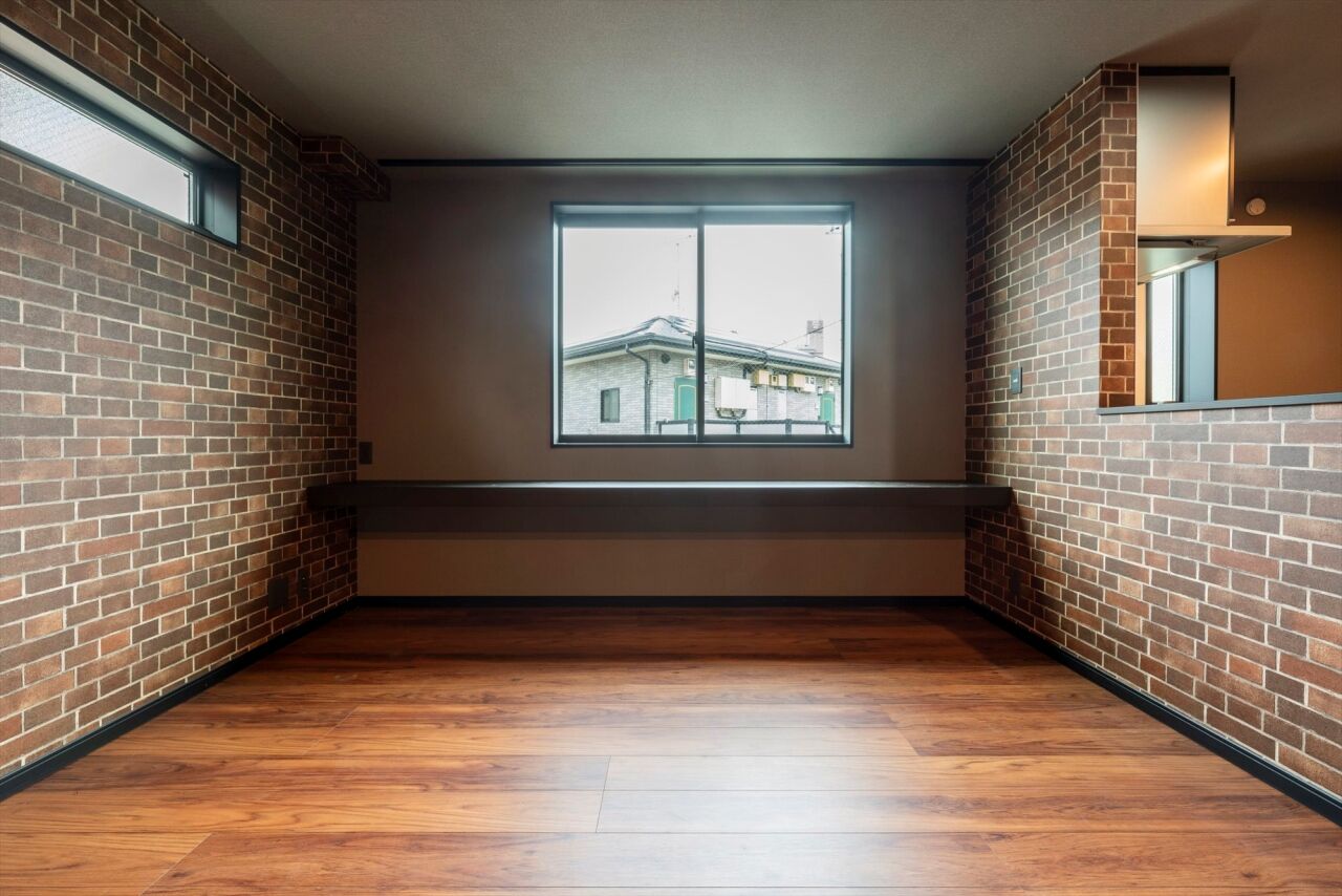 BLISS 【敷地面積15.2坪/2200万円/間取り図有り】煉瓦造り風の壁面が映える、狭小地に建つ開放的な賃貸併用住宅の建築実例画像3