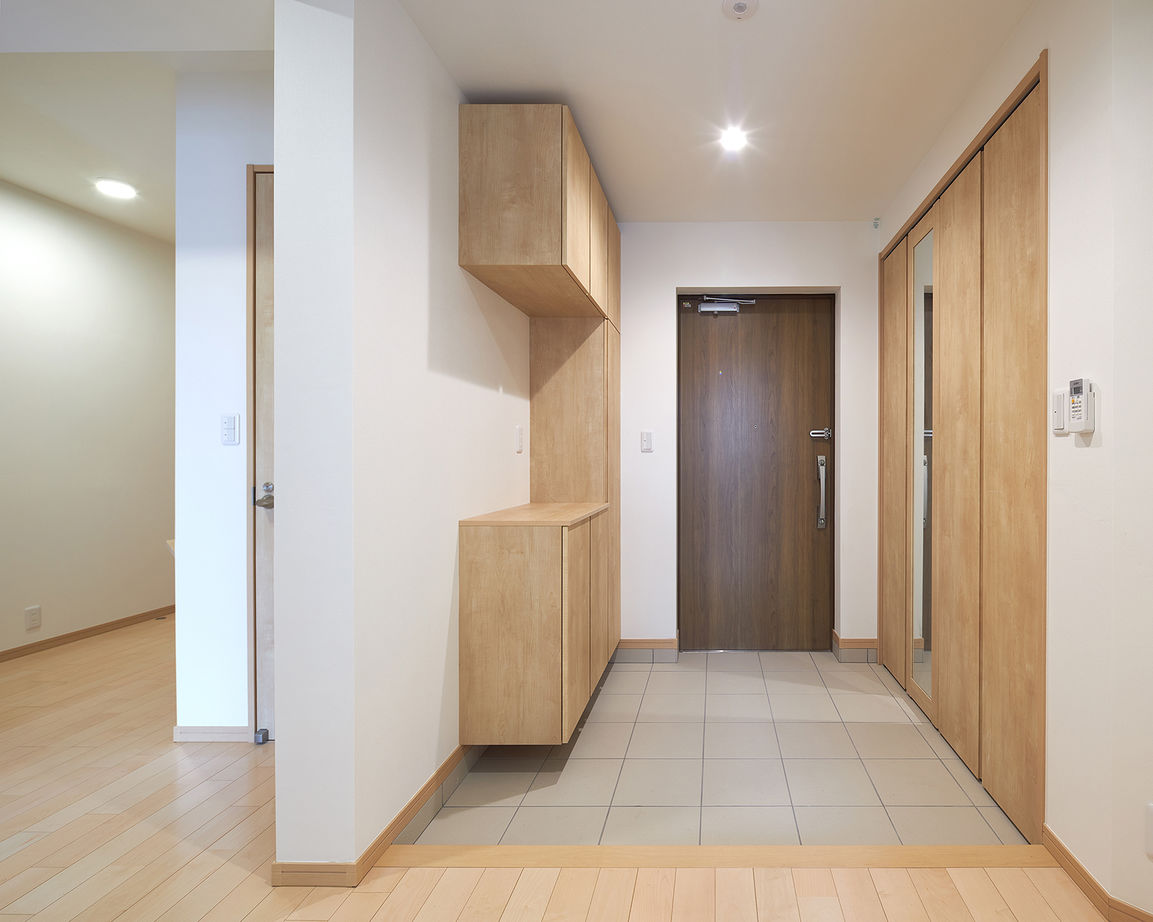 テクノホーム(一級建築士事務所) 【RC/賃貸併用】コンクリート打ち放しの外壁が美しい表情を見せる家。頑強なRC造の特性を活かしたリビングの建築実例画像9