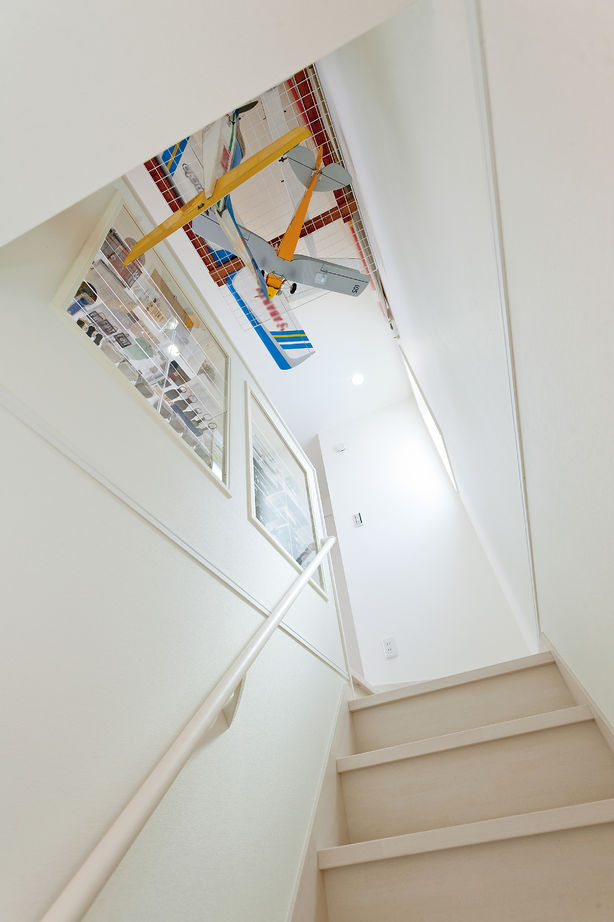 近藤建設 【30坪台/車2台/趣味部屋】一級建築士の施主も満足！寝室から愛車を眺める3階建てビルトインガレージハウスの建築実例画像9