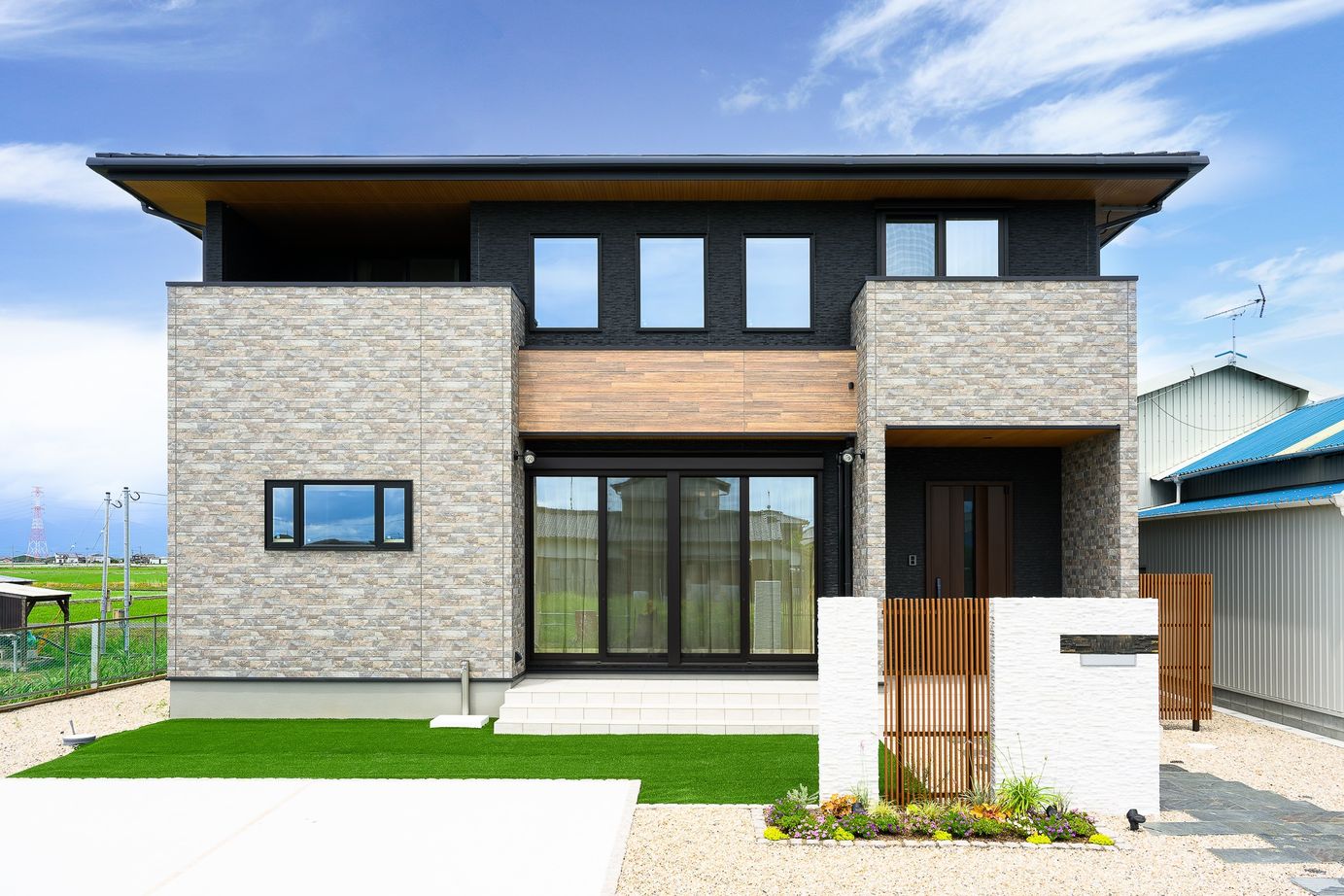 エースホーム 【吹抜け/和室/趣味部屋】1・2階分離／水回り共有型の二世帯住宅の建築実例画像1