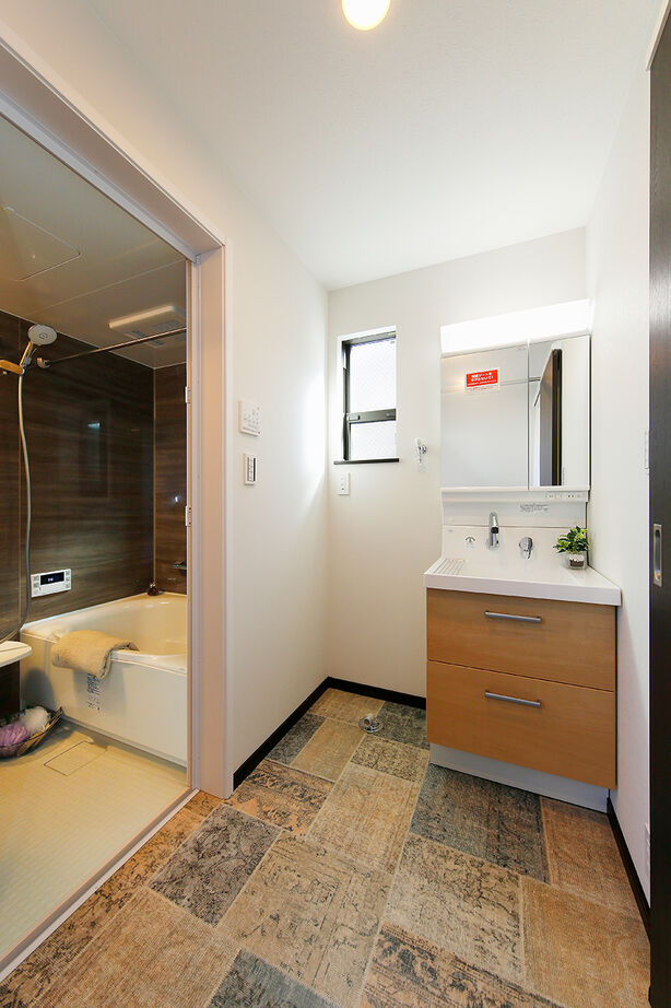 ワイケイホーム 【約14坪・間口4ｍ】ビルトインガレージ＋スカイバルコニー＋ホテル仕様の室内/高さ制限を見事にクリアの建築実例画像7