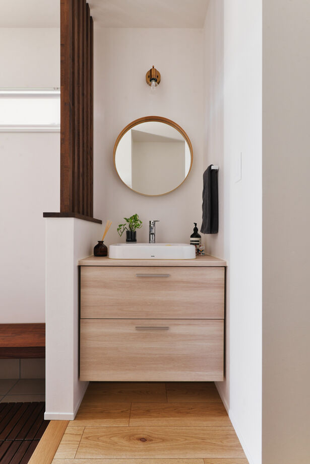 TAINN DESIGN　一級建築士事務所 【3045万円/30.3坪/ペットと暮らす/間取り図あり】ウォールナットの家具が映える吹き抜けのリビングの建築実例画像15