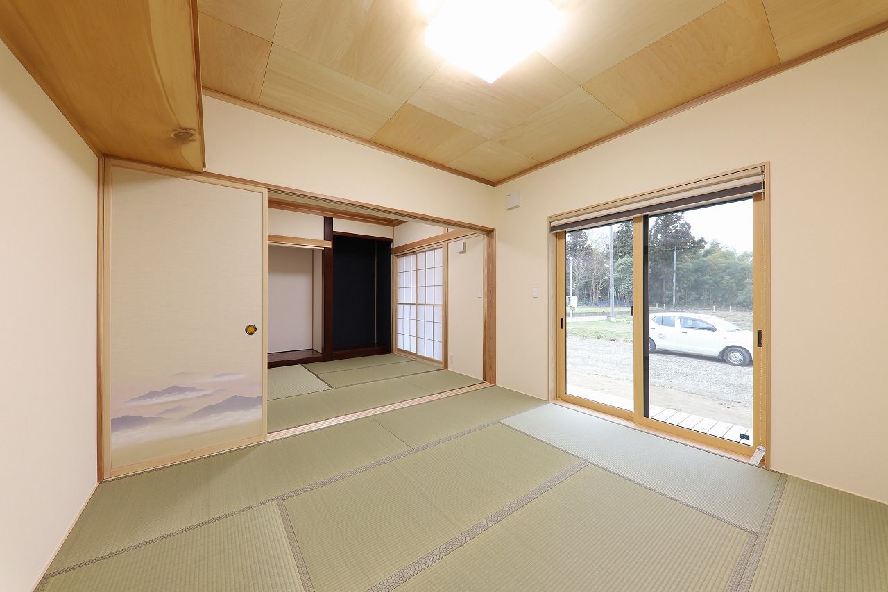 サカヅメハウジング 木の香りに包まれた広々リビングは、心地よい寛ぎに満ちて。3世帯で暮らす和モダンの家の建築実例画像6