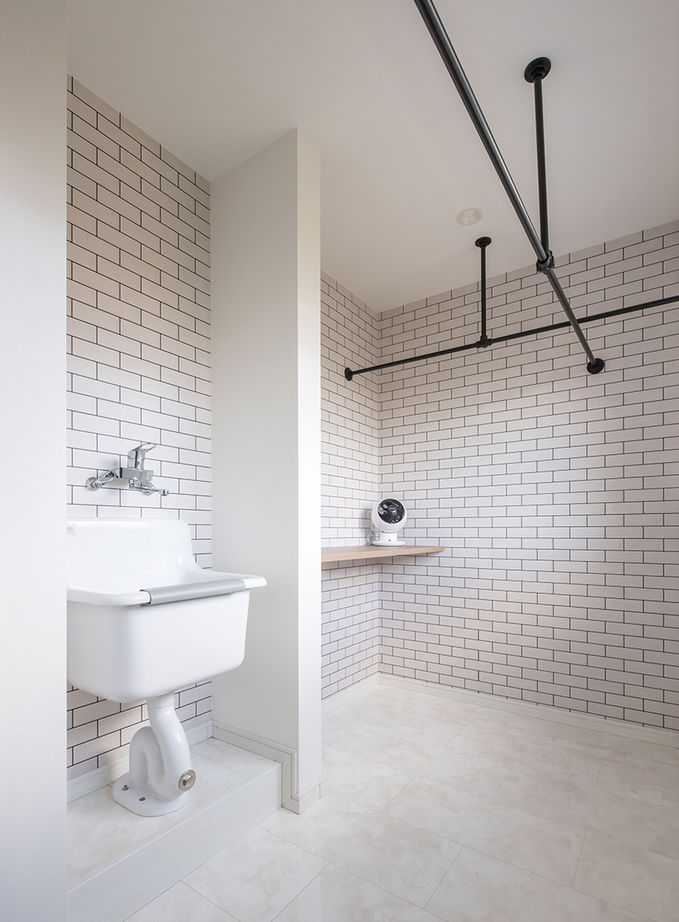 ヤマダホームズ 吹き抜けがひときわの開放感を生む大空間のLDKで、大らかに子育てを楽しむ住まいの建築実例画像6