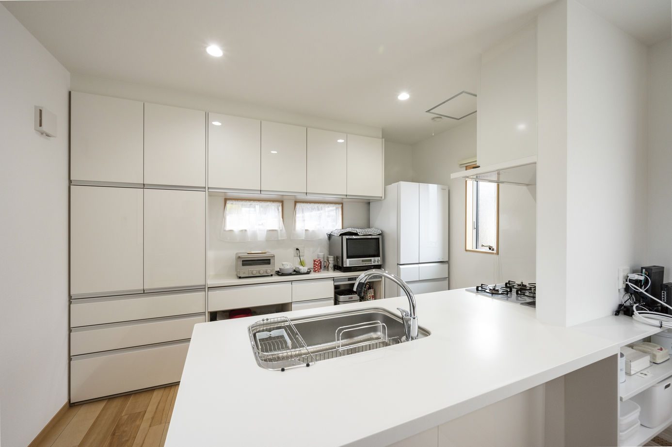 児島産業 【2000万円台/間取り図掲載有】空間の広がりと変化を楽しむ、ひと味違うスキップフロアのある二世帯住宅の建築実例画像5