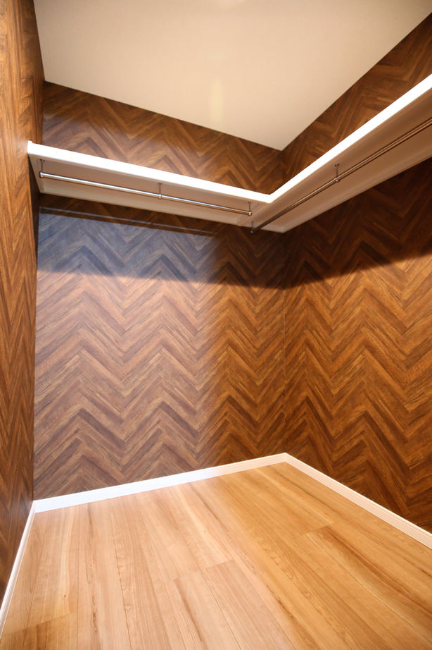 ヤマイチ住建 【大阪市/3階建て/2000万円台】凝った天井の意匠や間接照明で、オンリーワンのリビングをデザインの建築実例画像9