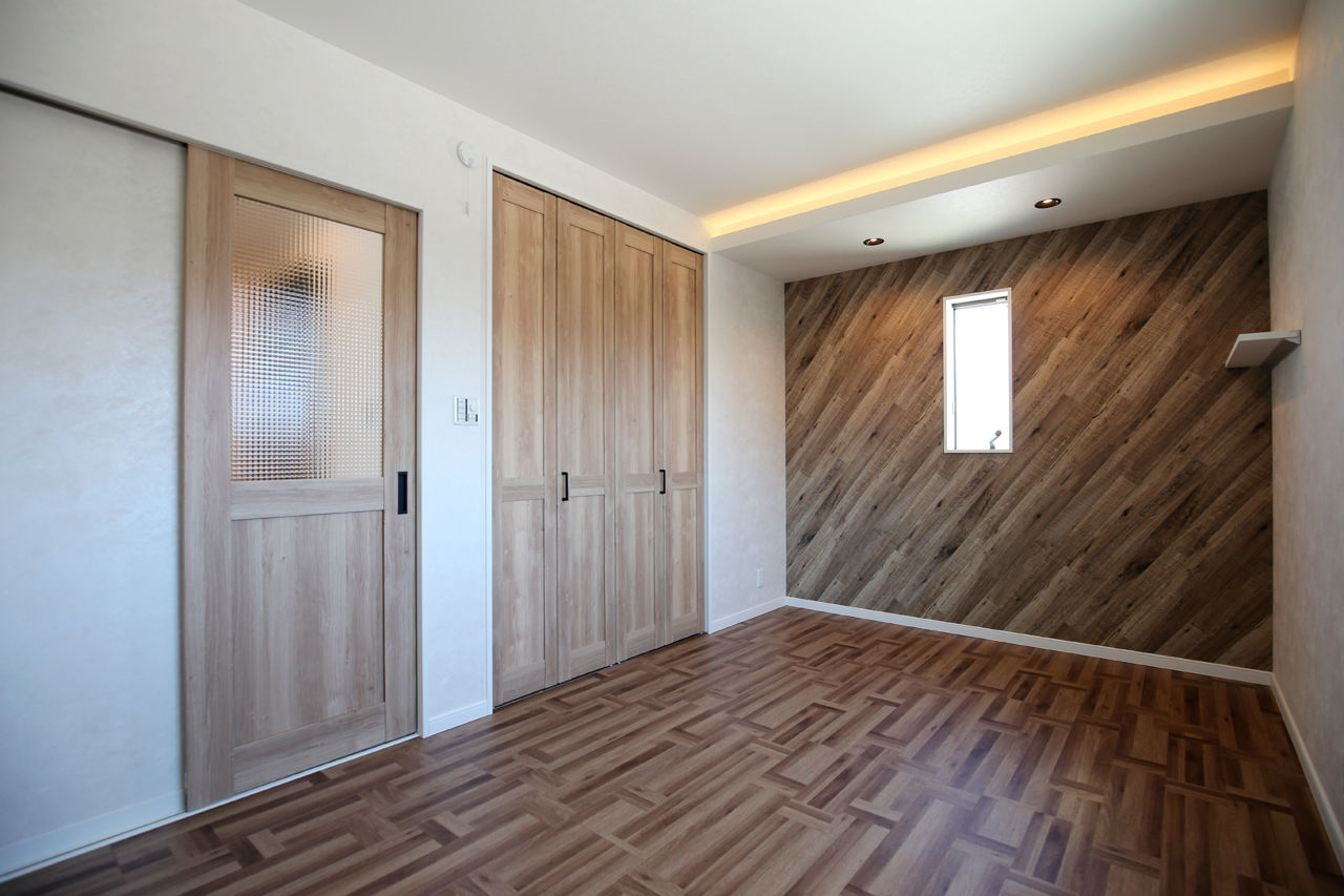 ヤマイチ住建 【大阪市/3階建て/2000万円台】白いフロアに黒いキッチン。光のラインが形づくるクールモダンな住まいの建築実例画像7