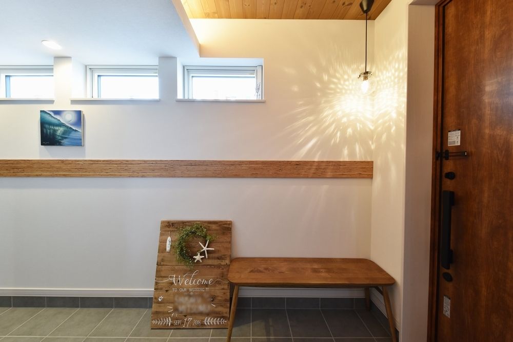 住研ハウス 【苫小牧市/3人家族/4LDK間取図】サーフボードをディスプレイできる玄関土間収納、ナチュラルテイストな家の建築実例画像3