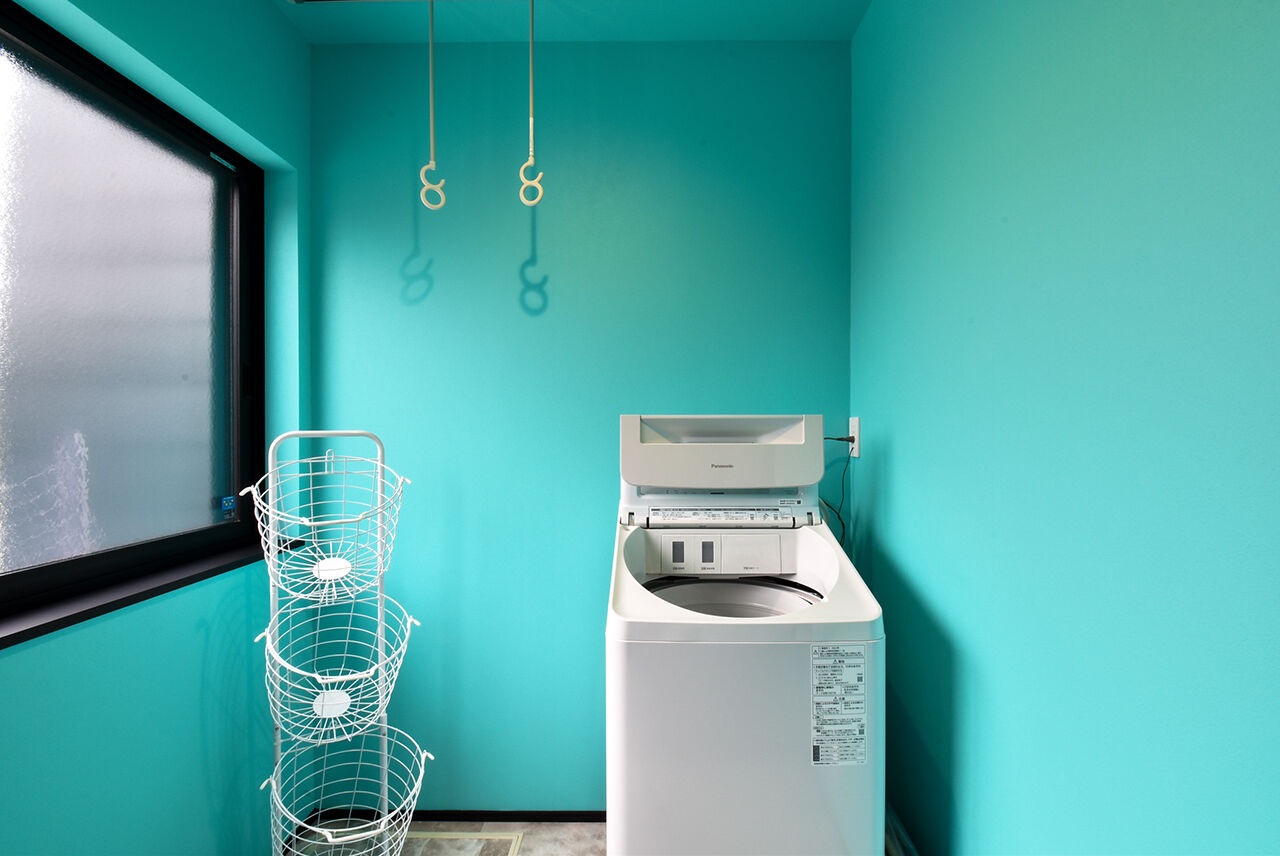 ワイケイホーム 【スキップフロア】モノトーンで統一された空間が実現した、高級感あふれる住まいの建築実例画像9