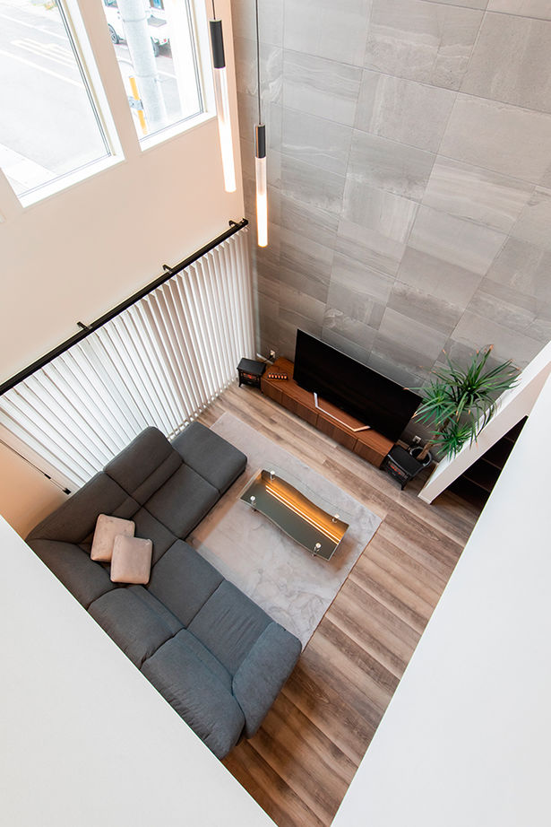 昭和ハウジング泉州・パナソニックビルダーズグループ 【3000万円台/テクノ工法/泉佐野市/車2台】吹き抜けのある広々リビング！洗練された大人のおしゃれ空間の建築実例画像5