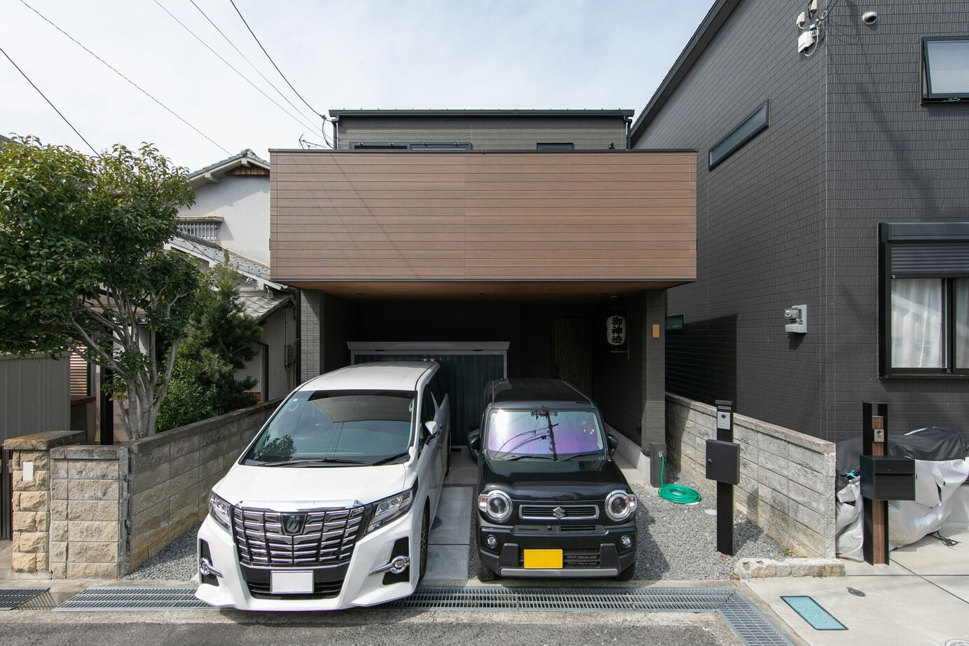 昭和ハウジング泉州・パナソニックビルダーズグループ 【貝塚市/２台駐車】木目とブラックが映える、家事ラクな回遊動線の家の建築実例画像13