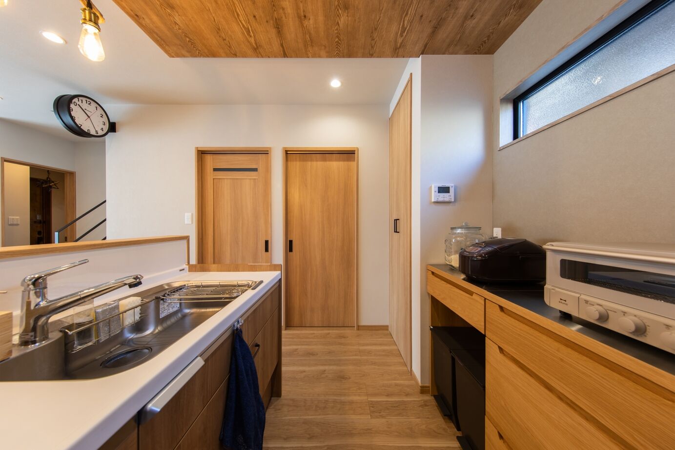 昭和ハウジング泉州・パナソニックビルダーズグループ 【貝塚市】「自然素材とモダンデザインが調和する。収納と動線にこだわった、毎日が快適になる住まいの建築実例画像6