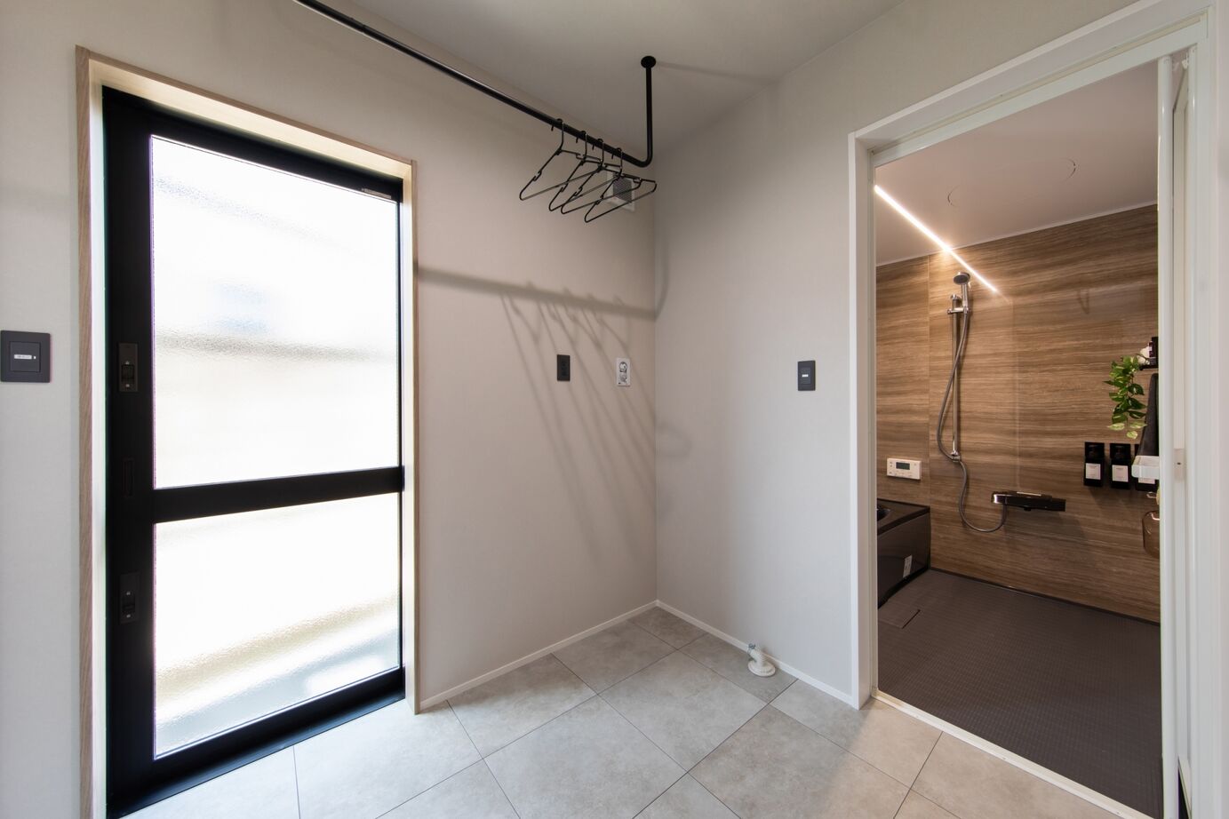 昭和ハウジング泉州・パナソニックビルダーズグループ 【貝塚市】ランドリールームや収納に工夫。ワークスペースも備えた、家族の時間を大切にする家の建築実例画像11