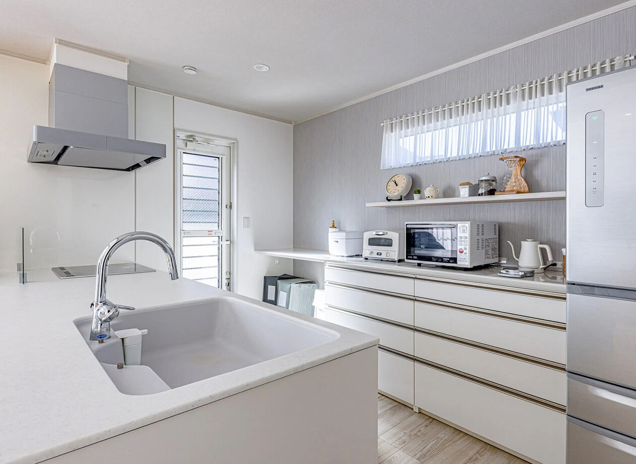 イシンホーム三郷　松井産業 【二世帯住宅/高気密・高断熱/省エネ・創エネ】二世帯それぞれの暮らしに合わせた空間設計の建築実例画像3