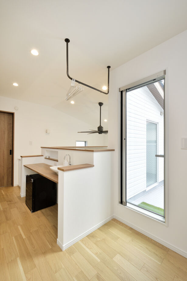 大原建設（パナソニックビルダーズグループ） 【緑を感じるルーフバルコニーのある33坪の郊外の家／間取り有】小上がり付きの広々ＬＤＫを叶えた屈強構造の建築実例画像8