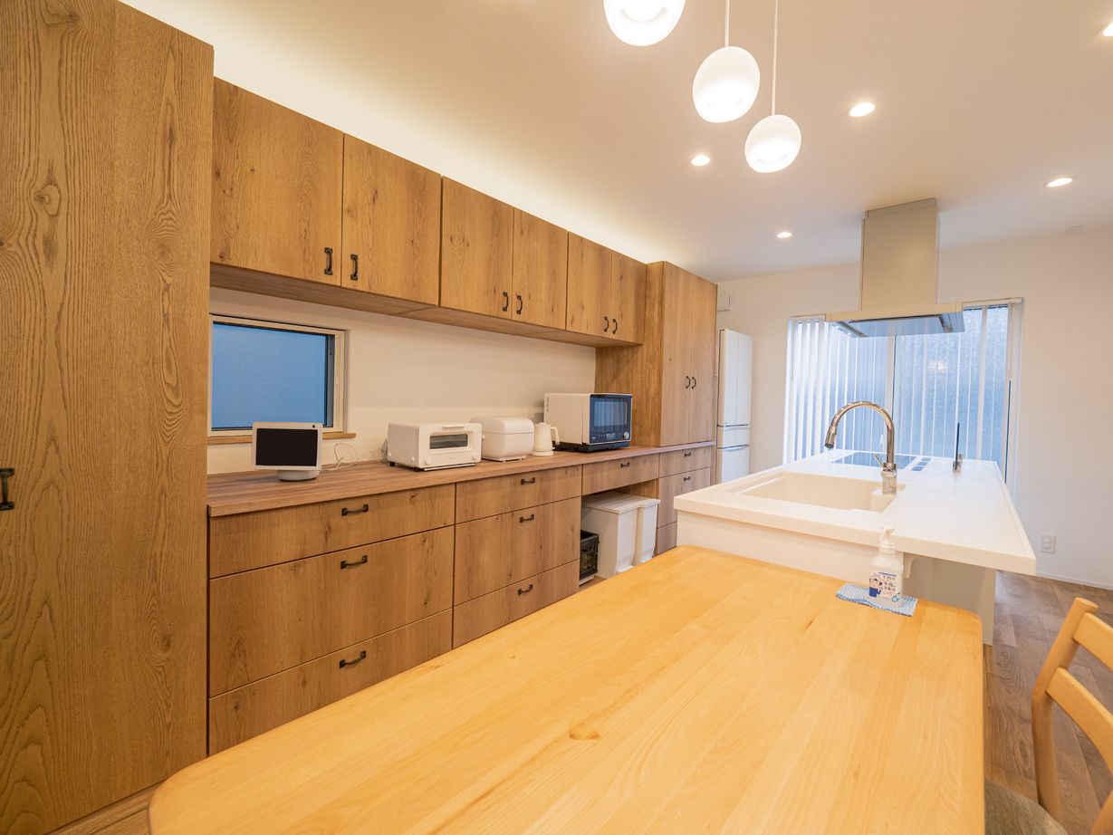 ドヒハウス 【2000万円台】ガレージをフル活用、「遊び」を楽しむ家。の建築実例画像1