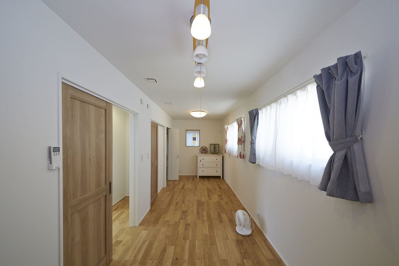 住空間設計Labo 【2000万円台・明石市】中庭のある三角屋根の家。行き止まりのない回遊動線で家事も子育てもしやすいの建築実例画像9