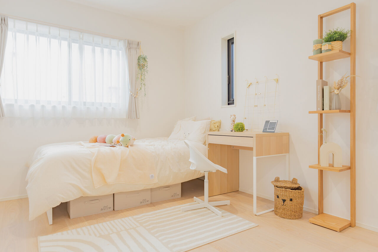 永代ハウス長崎 【平屋/ダウンリビング/中庭】明るいダウンリビングでくつろぐ、仲良し家族の平屋の建築実例画像6