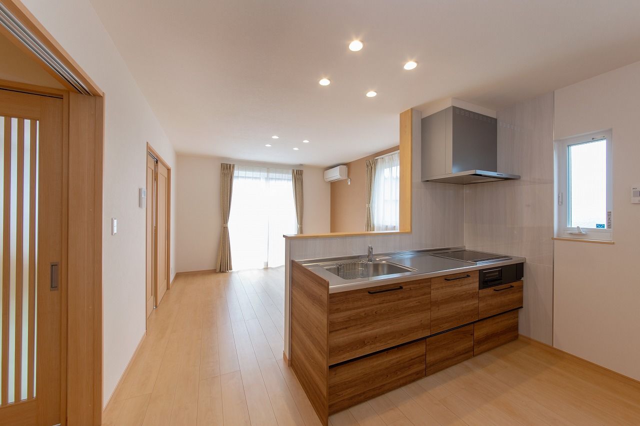 山田建築店 占有スペースと共有スペースをバランスよく組み合わせ、お互いの暮らしやすさに配慮した二世帯住宅の建築実例画像3