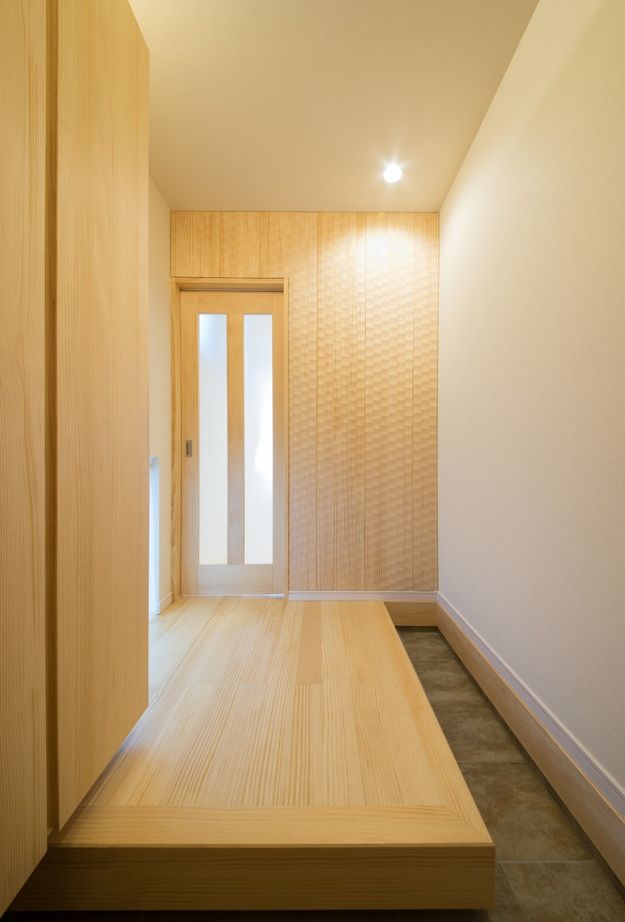 東宝ホーム モダンな外観のミニカーショップを兼ねたカフェ併用の住まいの建築実例画像4