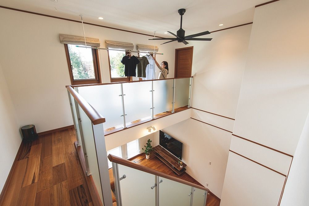 ウィザースホーム 【タイル／吹き抜け／間取図有】吹き抜けも、回廊も、外観もひと目惚れ。“好き”を集めた最高のわが家の建築実例画像8