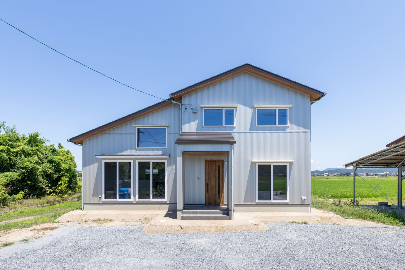 Wohl-heim(ウォルハイム)・株式会社タケイ ガルバリウム鋼板の外壁と小屋裏エアコンのある省エネ住宅の建築実例画像