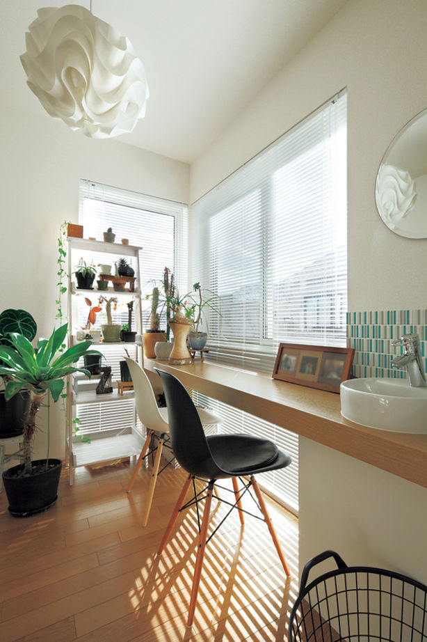 積水ハウス 【3階建て/重量鉄骨造/間取り有】ダイナミックな吹き抜けが見どころの、つながりを大切にした大空間の家の建築実例画像5