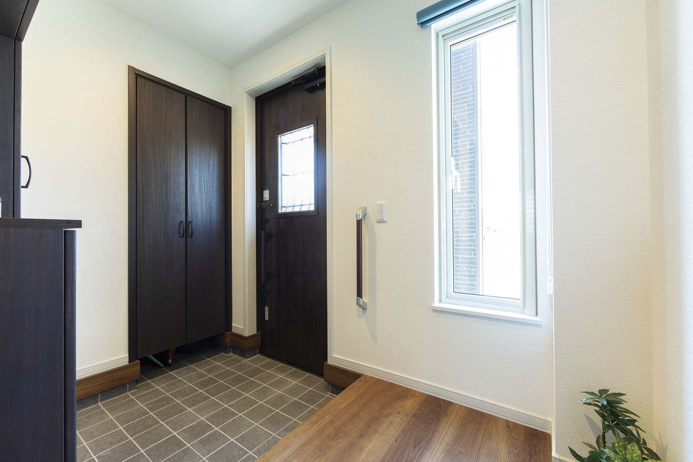 北海荘建 【4LDK/吹抜/全室床暖房/間取り図有】親子２代が選んだ会社♪カフェ風キッチンで会話も弾む♪の建築実例画像10