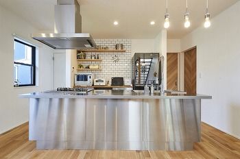 スタジオ・チッタ 【3450万円/55坪/間取り図有】芝生の庭を中心に、親子世帯がほどよい距離で暮らす。L字に配した二世帯住宅の建築実例画像6