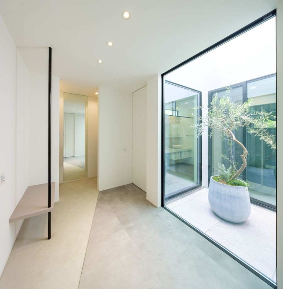 ハウスイズム建築設計事務所 【3000～3499万円/29.9坪/間取り有】美術館のようなリビングで、絵画と炎が彩る至福のひとときの建築実例画像10