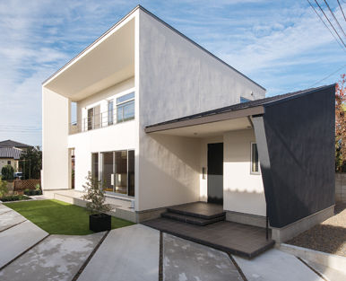 関工務所 【モダン／間取り図あり】ヘリンボーンの床と浮遊する階段をもつ家の建築実例画像2