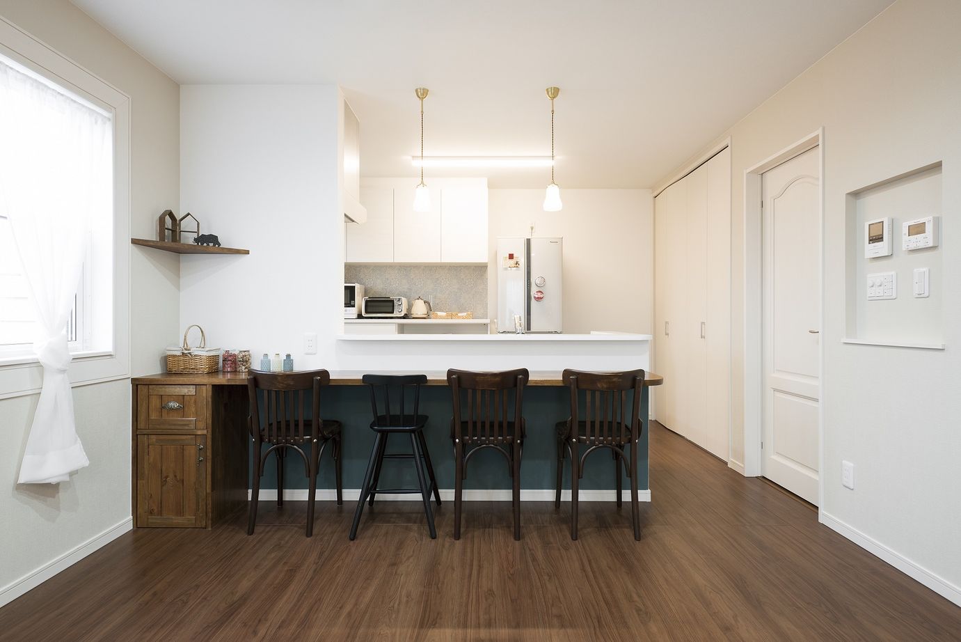 ソーフィールドホーム 空間に遊び心を取り入れて　距離感が心地よい二世帯住宅の建築実例画像2