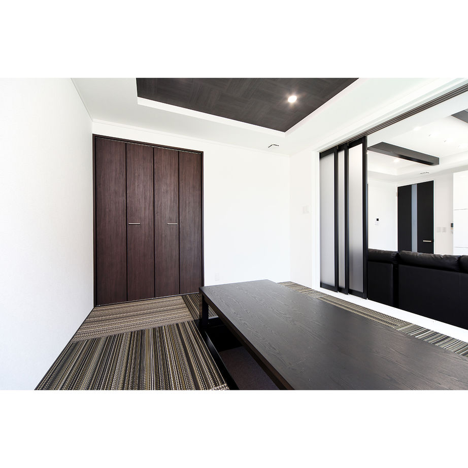 アイフルホーム宮城　東和総合住宅 【2100万円・間取有】黒とシルバーでまとめた個性的な外観。木目調のタイルデッキにも満足の建築実例画像3