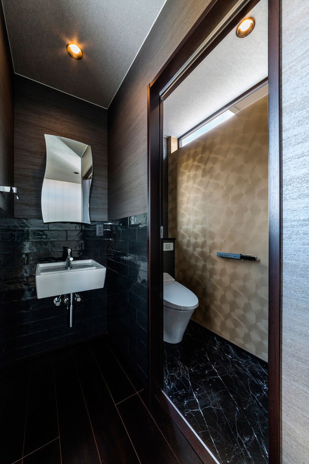 三交ホーム 【２世帯×２階リビング×ZEH】海を一望できるかっこいいシーサイドハウス。「温度差がなくて快適です」の建築実例画像8